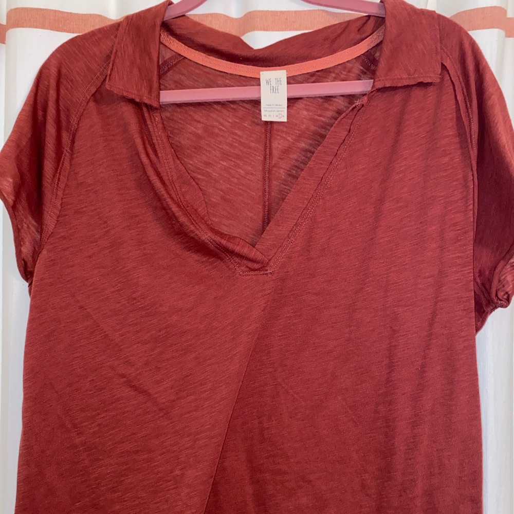 Free People cropped, collared, V neck.